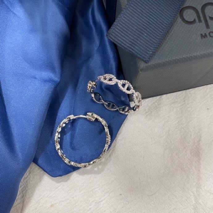 APM Monaco Silver Hoop Earrings with Diamond Accents
